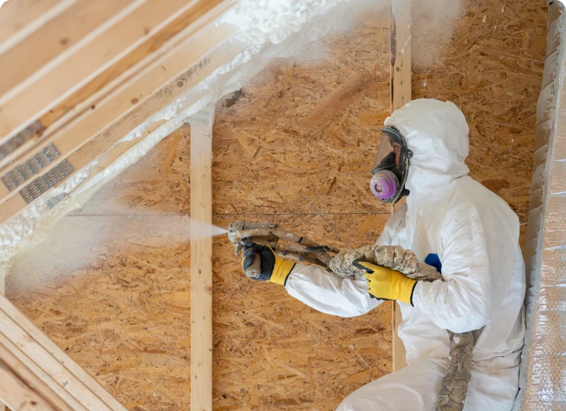 Insulation application in wooden attic space