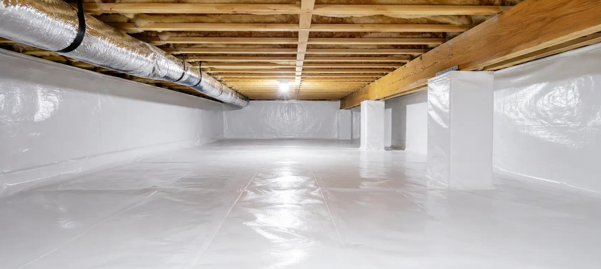 Sealed crawl space with wooden beams overhead