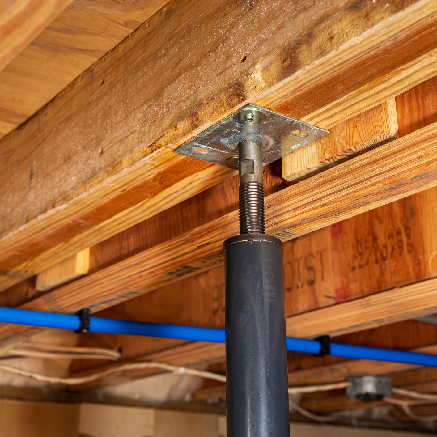 Basement ceiling with support beam