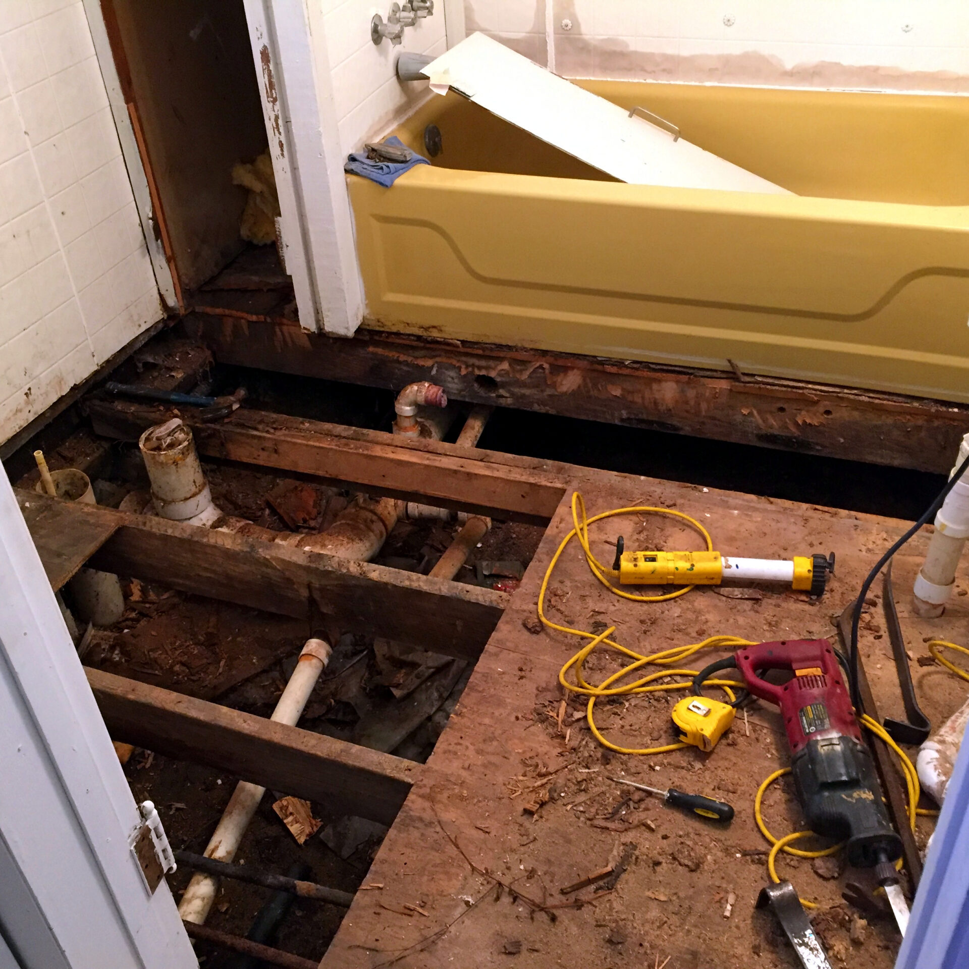 Bathroom floor removed for plumbing repair